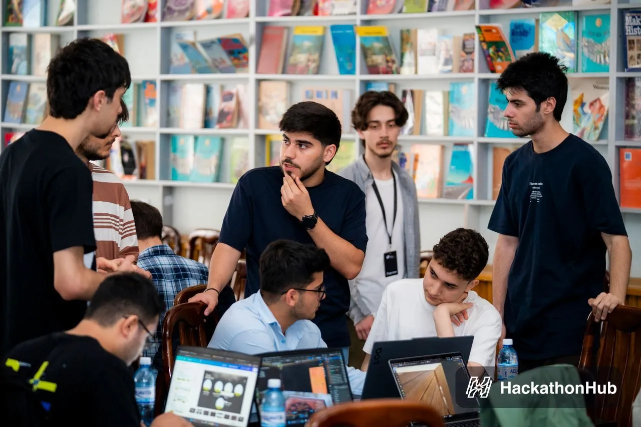Mentors with a team at the OYU GameDev Bootcamp
